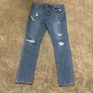 Blue jeans with rips
